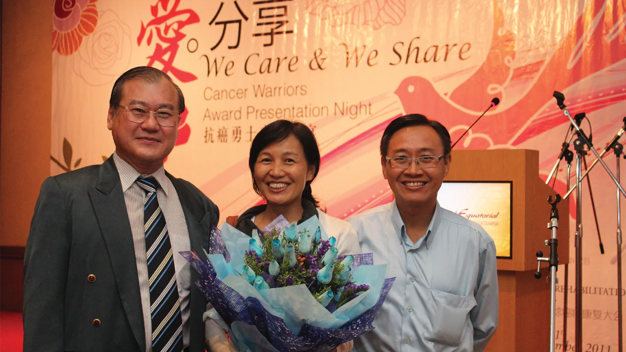 Mrs. Pang with family during her recovery journey
