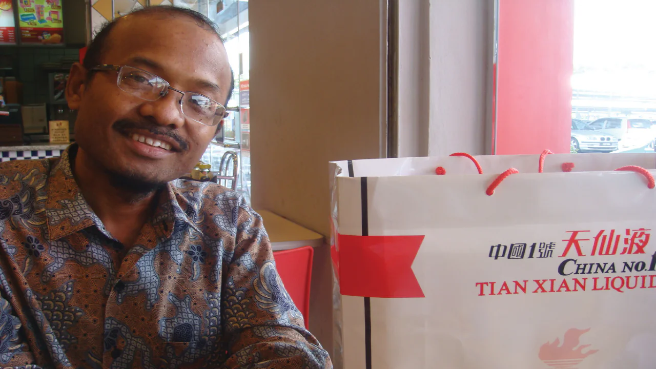 Mr. Charles smiling after battling brain cancer